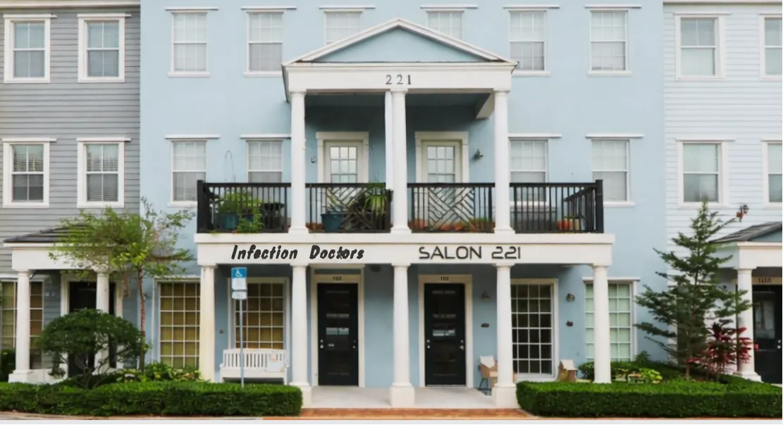 Exterior view of the light blue building facade for Salon 221 located in Jupiter Florida.